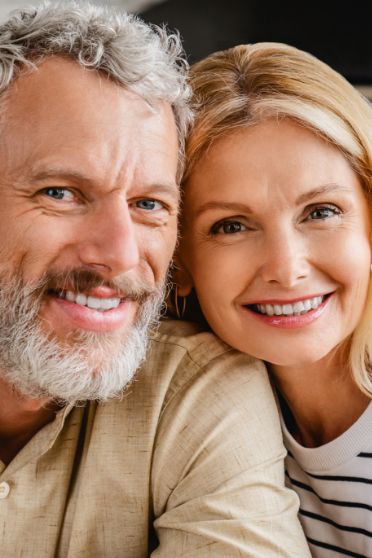 Older couple smiling together